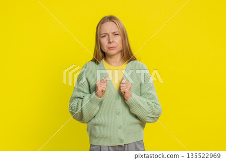 Sad young woman loses becoming surprised by lottery results bad fortune loss unlucky fortune news 135522969