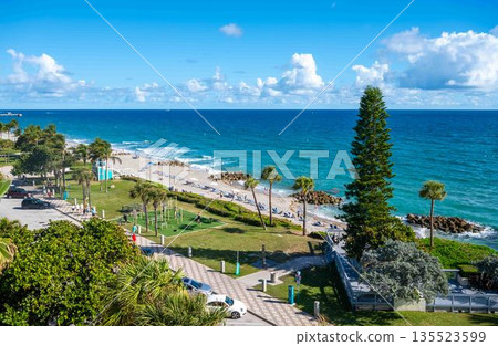 High angle drone view of idyllic Florida Deerfield Beach vacation travel background High angle drone view of idyllic Florida Deerfield Beach vacation travel background 135523599