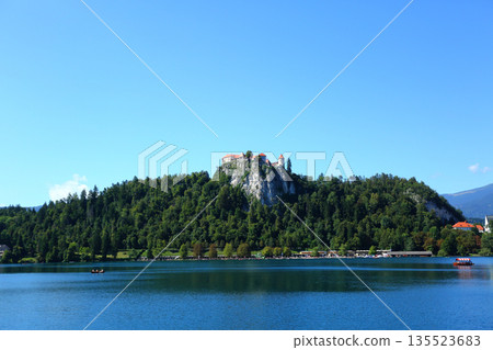 Scenic View of Lake Bled with Church on Bled Island, Slovenia Scenic View of Lake Bled with Church on Bled Island, Slovenia 135523683