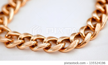 Luxury gold chain necklace macro shot isolated on soft white background 135524196