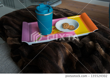 Blue coffee vacuum mug with cookies Blue coffee vacuum mug with cookies 135524302