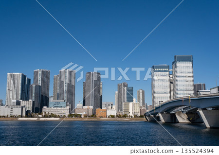 Harumi Bridge and high-rise apartment buildings in Toyosu, Tokyo Bay Area 135524394