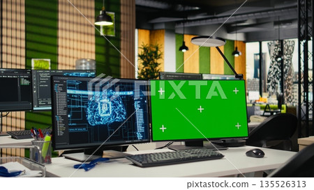 Chroma key PC in Silicon Valley company office used to automate repetitive tasks. Isolated screen computer on AI startup workplace desk used by engineers to design machine learning models 135526313