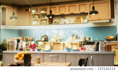 Empty kitchen island arranged with pizza essential such as flour, mozzarella, tomatoes and sauce. Baking tools and utensils line the countertop, reflecting home cooking vibe on the weekend. Empty kitchen island arranged with pizza essential such as flour, mozzarella, tomatoes and sauce. Baking tools and utensils line the countertop, reflecting home cooking vibe on the weekend. 135526314