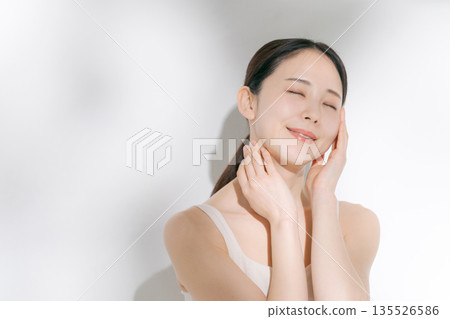 A young woman doing skin care A young woman doing skin care 135526586