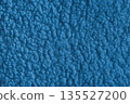 Blue color soft faux fur cloth texture with fluffy plush surface for cozy fabric backgrounds 135527200