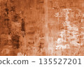 Abstract orange textured background with rough brush strokes and artistic grunge effect 135527201