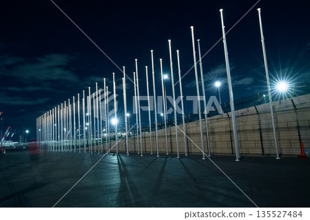Night view of the empty East Gate with the flag lowered after the closing of the Osaka Kansai Expo 135527484