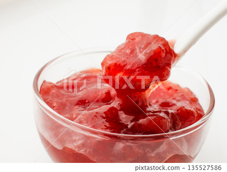Strawberry jam on a white background 135527586