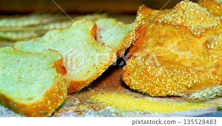 Detailed View Of Golden Toasted Bread Showing Textured Crust And Tender Inner Crumb Dusted With Flour Detailed View Of Golden Toasted Bread Showing Textured Crust And Tender Inner Crumb Dusted With Flour 135528483