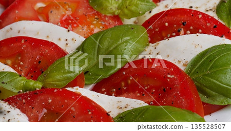 Colorful Sliced Tomato Cheese Basil Dish, Bright Tomato Fresh Mozzarella With Basil And Olive Oil 135528507