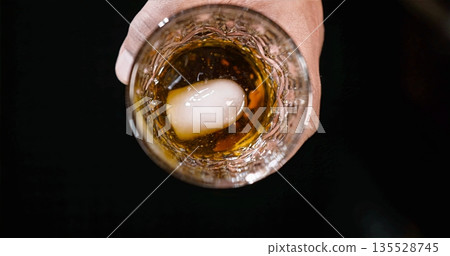 Stylish Alcohol Display Focusing On Icy Textures And Dark Shiny Backdrop For Sophistication Stylish Alcohol Display Focusing On Icy Textures And Dark Shiny Backdrop For Sophistication 135528745