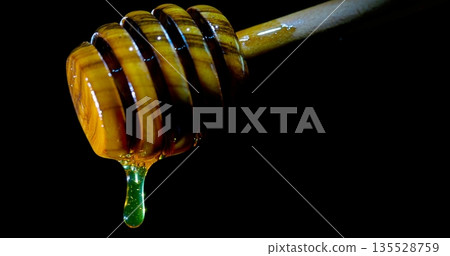 Artistic Composition Showcasing Thick Matcha Honey On Rustic Wooden Dipper For Gourmet Displays 135528759