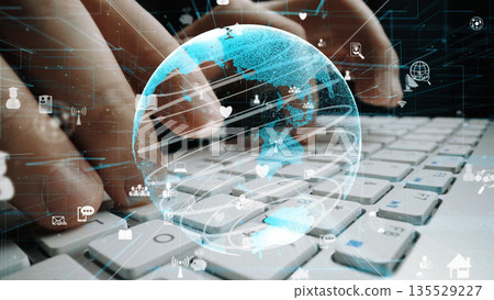 Futuristic Digital Communication Concept with Hands Typing on Keyboard Surrounded by Global Icons and High-Tech Elements in Modern Workspace xenic Futuristic Digital Communication Concept with Hands Typing on Keyboard Surrounded by Global Icons and High-Tech Elements in Modern Workspace xenic 135529227