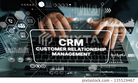 Hands Typing on Keyboard with Data Analysis Graphics and CRM Customer Relationship Management Text Overlay. Asymptotic smart data analytic Hands Typing on Keyboard with Data Analysis Graphics and CRM Customer Relationship Management Text Overlay. Asymptotic smart data analytic 135529467