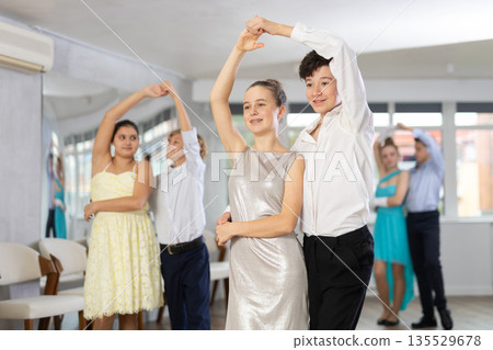 Classical dances performed by teenagers children in festive clothes Classical dances performed by teenagers children in festive clothes 135529678