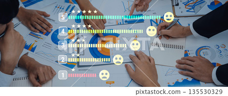 Team Collaboration on Business Metrics and Feedback Reviews with Charts, Graphs, and Emoji Ratings on a Table for Data Analysis and Decision Making Trope 135530329