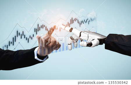 Human and Robot Interaction Concept Illustrated with a Businessman Touching a Robotic Hand Against a Background of Financial Graphs Scalp Human and Robot Interaction Concept Illustrated with a Businessman Touching a Robotic Hand Against a Background of Financial Graphs Scalp 135530342