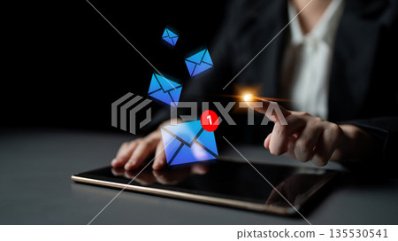 Digital communication concept with animated email notifications on a tablet, highlighting engagement in modern technology interactions Gantry Digital communication concept with animated email notifications on a tablet, highlighting engagement in modern technology interactions Gantry 135530541