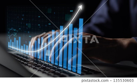 Dynamic Growth Visualization with Hands Typing on a Laptop in a Dark Setting with Rising Graph Bars Representing Data Analysis and Business Success Copula 135530603