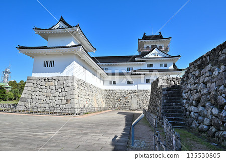 Toyama Castle in Etchu Province: The castle tower, moat, and stone walls on a clear day Toyama Castle in Etchu Province: The castle tower, moat, and stone walls on a clear day 135530805