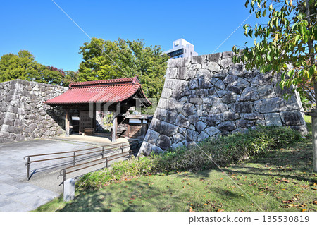 Toyama Castle in Etchu Province: The castle tower, moat, and stone walls on a clear day Toyama Castle in Etchu Province: The castle tower, moat, and stone walls on a clear day 135530819