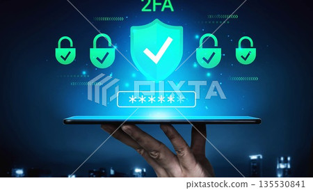 Digital security concept with two-factor authentication shield and lock icons on a tablet in a futuristic city night background for online protection Gluon Digital security concept with two-factor authentication shield and lock icons on a tablet in a futuristic city night background for online protection Gluon 135530841