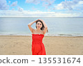 Portrait of a beautiful woman taken on the beach in Okinawa [Portrait Photo] 135531674