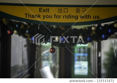 An exit decorated for Christmas An exit decorated for Christmas 135531872