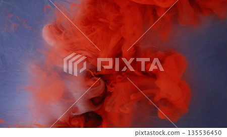 Paint background. Color water. Defocused orange blue glitter swirling flow chemical flame spreading on abstract dark black wet art. Paint background. Color water. Defocused orange blue glitter swirling flow chemical flame spreading on abstract dark black wet art. 135536450