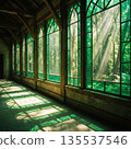 A hallway with stained glass and sunlight filtering through the trees 135537546