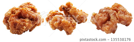 Crispy glazed fried chicken Karaage nuggets isolated on white transparent background. Concept of Asian cuisine and Japan 135538176