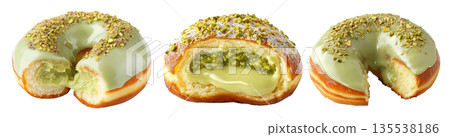 Donut filled with green pistachio cream, topped with glaze and crushed pistachios, isolated on white background Donut filled with green pistachio cream, topped with glaze and crushed pistachios, isolated on white background 135538186