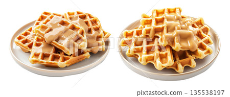 Waffles topped with creamy sauce served on white plate, isolated on white background, concept of sweet breakfast treat Waffles topped with creamy sauce served on white plate, isolated on white background, concept of sweet breakfast treat 135538197