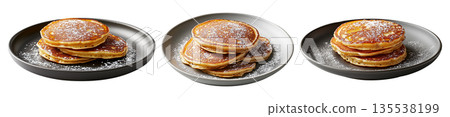 Stack of fluffy golden pancakes sprinkled with powdered sugar on a ceramic plate, isolated on white background Stack of fluffy golden pancakes sprinkled with powdered sugar on a ceramic plate, isolated on white background 135538199