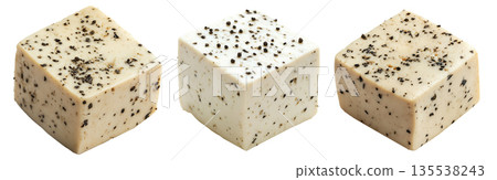 Cubes of seasoned tofu with visible herbs and spices, arranged in stack isolated on white transparent background 135538243