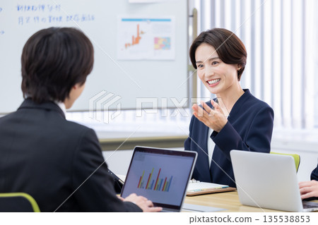 Business woman having a meeting Business woman having a meeting 135538853