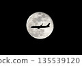 Moon and plane 135539120