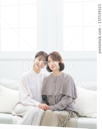 Cuddling mother girl Cuddling mother girl 135539323
