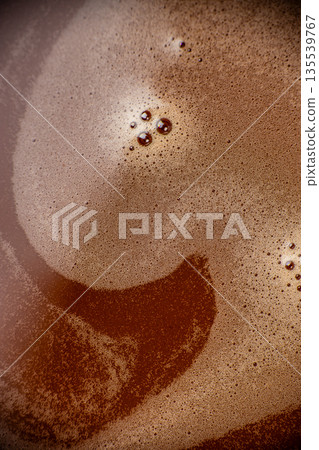 Hot chocolate foam texture close up with abstract creamy surface 135539767