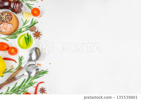 Minimal culinary background with fresh herbs, spices, olive oil and kitchen utensils arranged on white surface with copy space Minimal culinary background with fresh herbs, spices, olive oil and kitchen utensils arranged on white surface with copy space 135539801