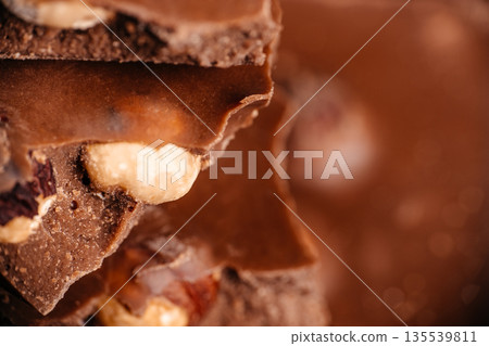 Milk chocolate with nuts macro close up and soft focus background 135539811
