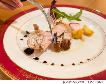 Roast pork steak served with balsamic vinegar and rock salt. Roast pork steak served with balsamic vinegar and rock salt. 135539821