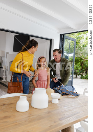 Family enjoying quality time together at home, smiling and sharing joyful moment 135540832