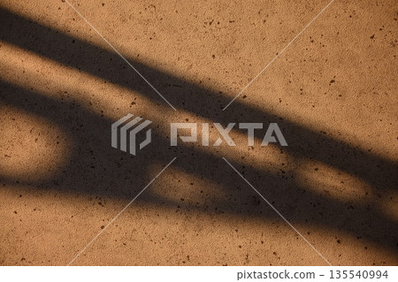 Concrete wall bathed in the setting sun Concrete wall bathed in the setting sun 135540994