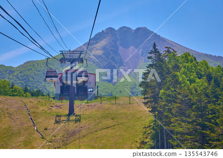 View of Mount Nikko Shirane from the ropeway in Katashina Village, Tone County, Gunma Prefecture on an early summer morning View of Mount Nikko Shirane from the ropeway in Katashina Village, Tone County, Gunma Prefecture on an early summer morning 135543746