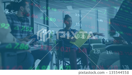 Collaborating wheelchair user sharing finance ideas in office, with yellow folder, stock overlay Collaborating wheelchair user sharing finance ideas in office, with yellow folder, stock overlay 135544558