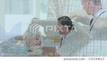 Listening Asian nurse placing stethoscope on patient at hospital bed, with digital data overlays Listening Asian nurse placing stethoscope on patient at hospital bed, with digital data overlays 135544617