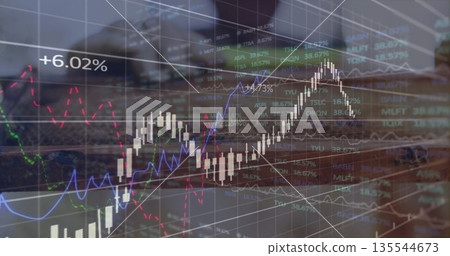 Displaying market data overlay on office desk, with laptop keyboard and percentage labels 135544673