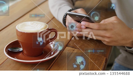 Man wearing tan sweater gripping phone at cafe table, with latte cup, floating icons, copy space Man wearing tan sweater gripping phone at cafe table, with latte cup, floating icons, copy space 135544688